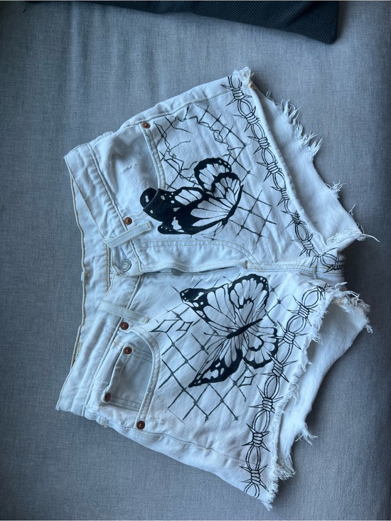Levi's Pants - Levi's White Denim Shorts with Black Butterfly Motif